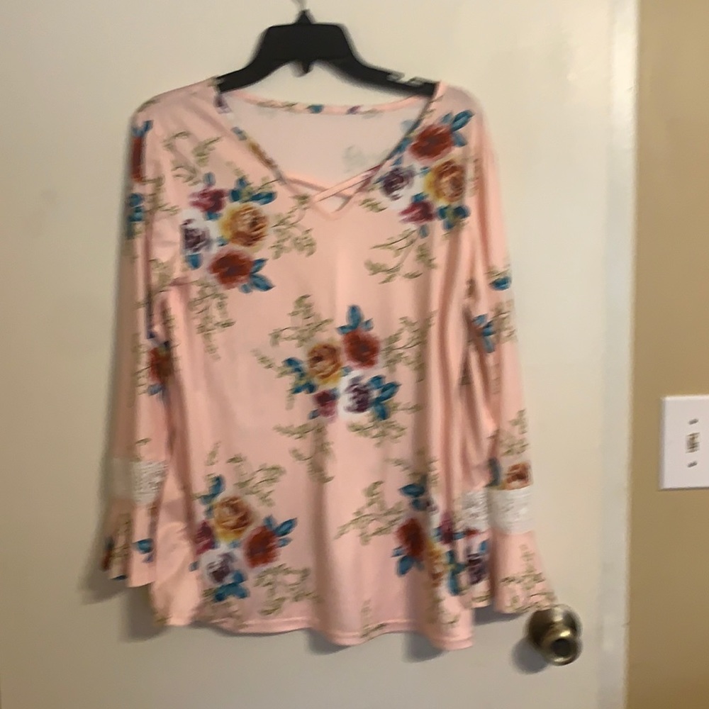 NWOT pink with floral design with lace on sleeves